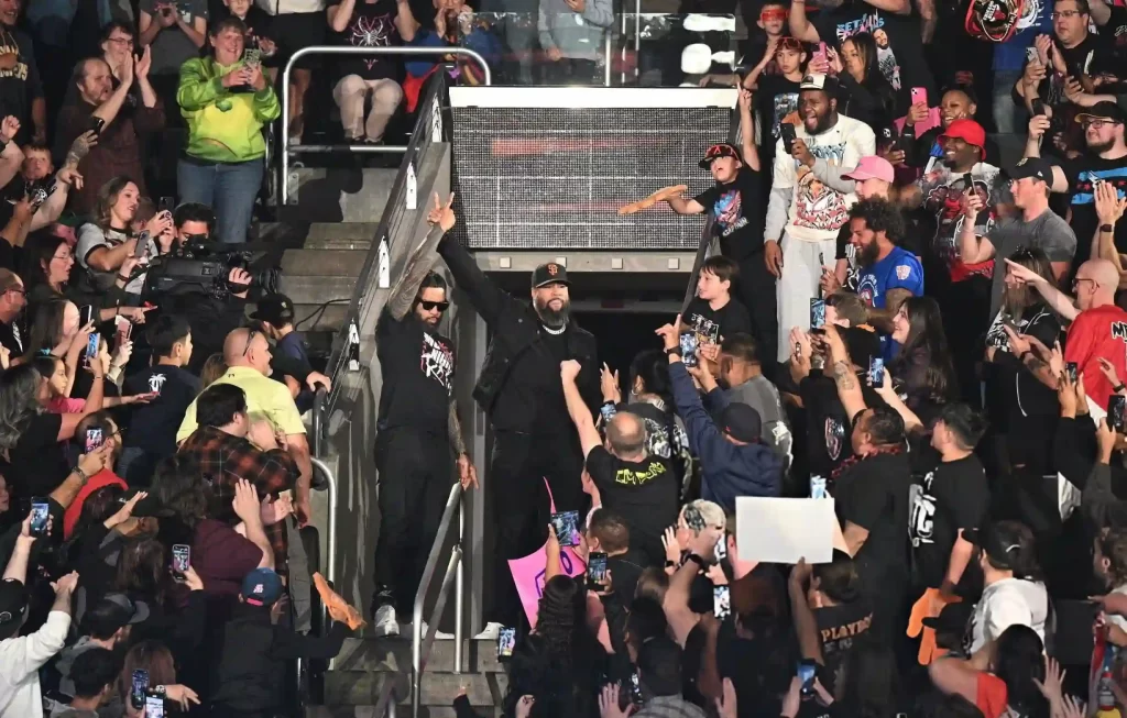 Punk and AJ Lee vs Becky Lynch and Seth Rollins