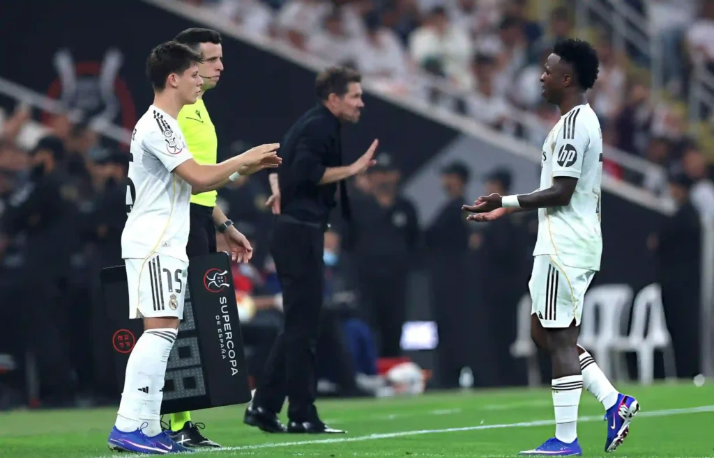 Diego Simeone and Vinicius Jr