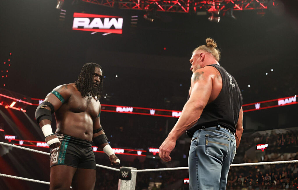 Roman Reigns and CM Punk segment. In pucture is Brock Lesnar and Oba Femi