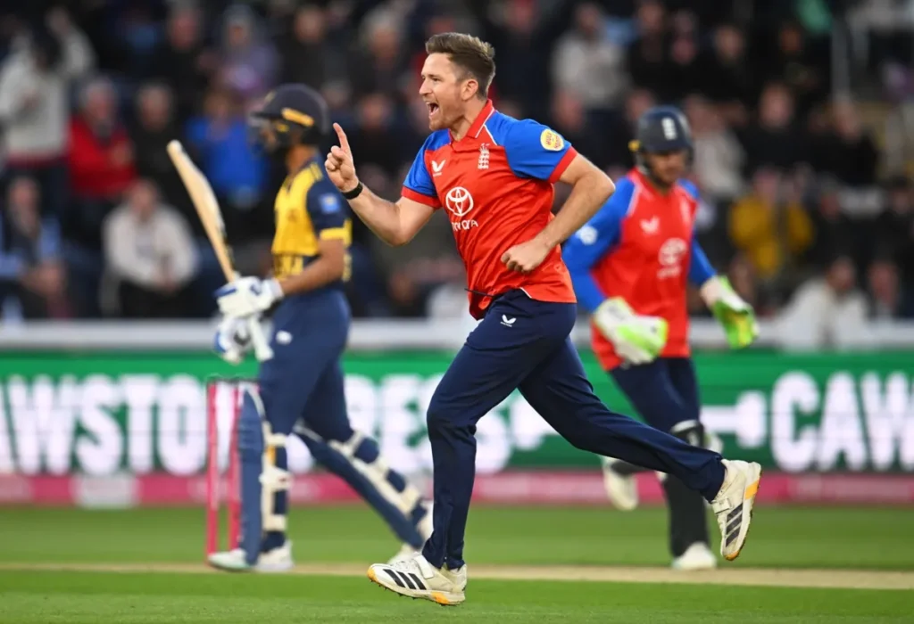 England Vs Sri Lanka 2026 3rd T20I Prediction, Playing 11, Top Picks England Vs Sri Lanka 2026 3rd T20I Prediction https://img1.hscicdn.com/image/upload/f_auto,t_ds_w_1200,q_60/lsci/db/PICTURES/CMS/422600/422675.jpg Photo: Getty Images ENG Vs SL Match Prediction: England has wrapped up the result of this three-match T20I series with a game to spare. They defeated the Lankans by over 100 runs in the first game, then won the second with about eight overs to spare. The Three Lions will now look to whitewash Sri Lanka. On the other hand, the visitors will play to avoid the embarrassment of a 3-0 defeat. The English Cricket Team is gearing up towards The Ashes later this year in the Australian summer. In 2026, this team reached the semi-finals of the T20 World Cup, only to lose to eventual champions India in a close game. After the IPL ended, the Three Lions hosted New Zealand for a three-game Test series. They won the first, but were trounced in the latter two, losing the series 2-1 right before defeating India 4-0 in a T20I series and 2-1 in an ODI series. They followed it up with a whitewash of Pakistan in a three-match Test series, winning all the games by massive margins As for the Sri Lankan Cricket Team, they made it to the Super Eight stage of the 2026 T20 World Cup, but were knocked out before the knockouts. After the IPL came the tour to the West Indies, where the Lankan Lions beat the hosts 1-0 in a three-game ODI series, but lost the subsequent Test series and the Test series as well. Most recently, they faced India in two tests at home, losing the first and drawing the second. ENG Vs SL Match Prediction Date and Time: Date: Saturday, September 19, 2026 Time: 07:00 PM onwards (IST); 02:30 PM onwards (local time) Venue: Old Trafford Cricket Ground, Manchester ENG Vs SL Live Streaming: How To Watch The England Vs Sri Lanka 3rd T20I of the 2026 series will be broadcast live on the Sony Sports Network on TV in India. It will be live-streamed on the SonyLiv app and website on mobiles, laptops, and other streaming devices. ENG Vs SL Team; Full Squads: England Full Squad: Harry Brook (C), Tom Banton (wk), Jos Buttler (wk), Jordan Cox (wk), Ben Duckett, James Coles, Aneurin Donald, Liam Dawson, Will Jacks, Adil Rashid, Jamie Overton, Jofra Archer, Sonny Baker, Gus Atkinson, Saqib Mahmood, Josh Tongue Sri Lanka Full Squads: Charith Asalanka (C), Lahiru Udara (wk), Kamil Mishara (wk), Pathum Nissanka, Pavan Rathnayake, Kamindu Mendis, Janith Liyanage, Tharindu Ratnayake, Dasun Shanaka, Wanindu Hasaranga, Maheesh Theekshana, Dushmantha Chameera, Dilshan Madushanka, Eshan Malinga, Nuwan Thushara, Dunith Wellalage England Vs Sri Lanka Prediction Tests: Head-to-Head Matches Played: 20 England Won: 16 Sri Lanka Won: 04 No Result: 00 First Played: June 15, 2006 (SL win) Last Played: September 17, 2026 (ENG win) ENG Vs SL Toss Update *To be updated after the toss* ENG Vs SL Team; Predicted XIs: England Predicted XI: Aneurin Donald, Jos Buttler (wk), Harry Brook (C), Tom Banton, Jordan Cox, Will Jacks, Jamie Overton, Liam Dawson, Jofra Archer, Sonny Baker, Adil Rashid Sri Lanka Predicted XI: Pathum Nissanka, Lahiru Udara, Kamil Mishara (wk), Charith Asalanka (C), Kamindu Mendis, Dasun Shanaka, Wanindu Hasaranga, Dushmantha Chameera, Tharindu Rathnayake, Eshan Malinga, Dilshan Madushanka ENG Vs SL 3rd T20I 2026 Old Trafford Cricket Ground Pitch Report A properly balanced ground, the pitches at the historic Old Trafford Cricket Ground provide a fine battle between bat and ball. On tracks where bowling is more supported, the grass on the surface provides fast bowlers with proper conditions to dominate the early game, especially in the first innings. Halfway through the first inning, the batter came back into play. At some point in the second inning, even the spinner joins the action. As for the dimensions, the square boundaries are smaller, around 65m. The straight boundaries are much longer, over 70m and can even go up to 75-76m. ENG Vs SL 3rd T20I Weather Forecast Rain is expected throughout the matchday in Manchester. In the afternoon, there is a strong chance of some decent rain under a completely cloudy sky. The temperature will peak in the high 10s. The winds will be quite strong, and the humidity will be high. ENG Vs SL 3rd T20I 2026 Match Sri Lanka Prediction: 3 Players To Watch Out For The 3 players to watch out for in the ENG Vs SL 2026 3rd T20I are: England batter Tom Banton Sri Lanka batter Pathum Nissanka England all-rounder Liam Dawson England Vs Sri Lanka Prediction: Who Will Win Today’s 3rd T20I? For the ENG Vs SL 2026 3rd T20I Prediction, England will defeat Sri Lanka in the 3rd T20I of this three-match series Keywords - ENG Vs SL Match Prediction, England Vs Sri Lanka Prediction, 3rd T20I, Old Trafford Cricket Ground Pitch Report, Weather Report, Harry Brook, Charith Asalanka, Tom Banton, Pathum Nissanka, Liam Dawson
